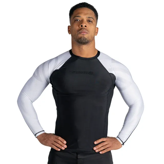 Athlete wearing a black rash guard with white long sleeves