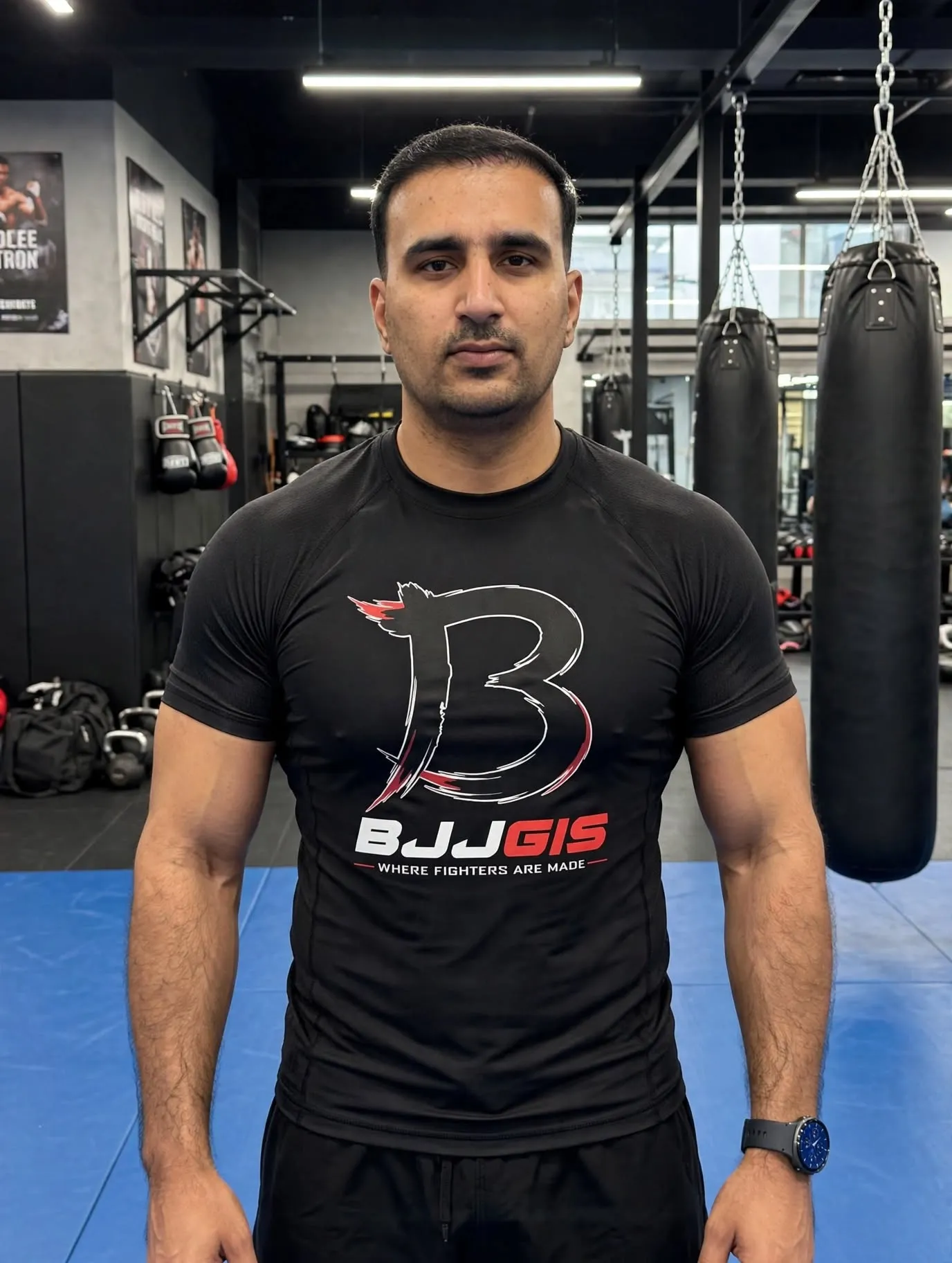 Athlete wearing a black short sleeve BJJ rash guard