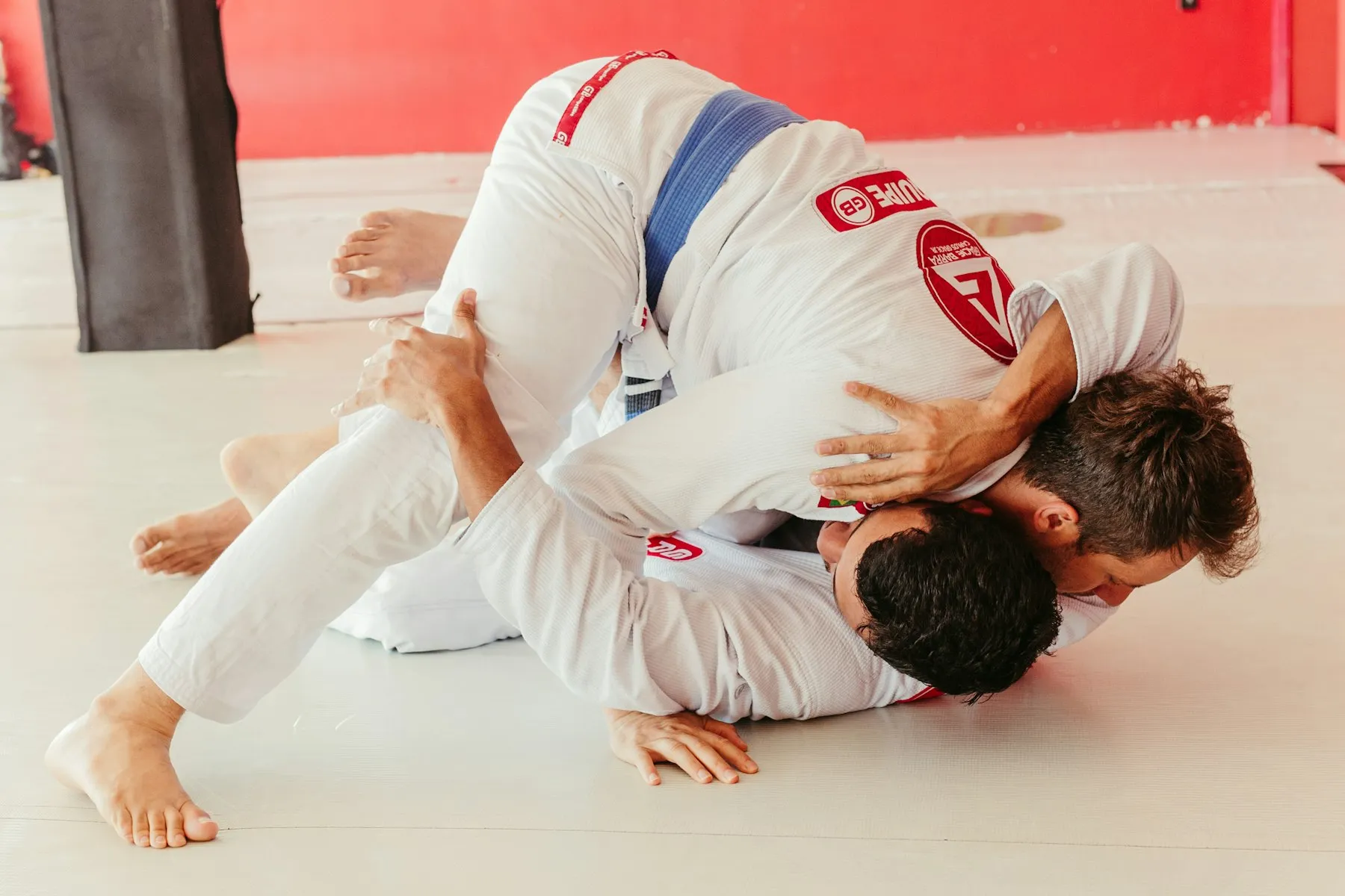 Athlete wearing a finished white BJJ Gi
